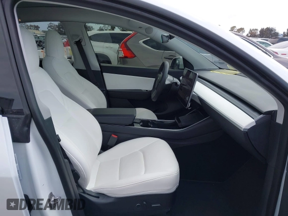 2021 Tesla Model Y Long Range with VIN 5YJYGDEE3MF081304, listed as a IAAI auction lot 42119270 with 90,521 mi miles. Bid and sale history available at carsss.com. Image 5.