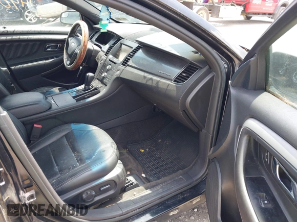 2015 Ford Taurus SEL z VIN 1FAHP2E88FG136181, wystawiony jako IAAI lot #42681490 z przebiegiem 230 000 mil mil oraz . Historia ofert i sprzedaży dostępna na DreamBid. Obrazek 5.