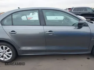 2015 Volkswagen Jetta Sedan 1.8T SE with VIN 3VWD17AJ9FM286917, listed as a IAAI auction lot 41904565 with 166,841 mi miles. Bid and sale history available at carsss.com. Image 13.