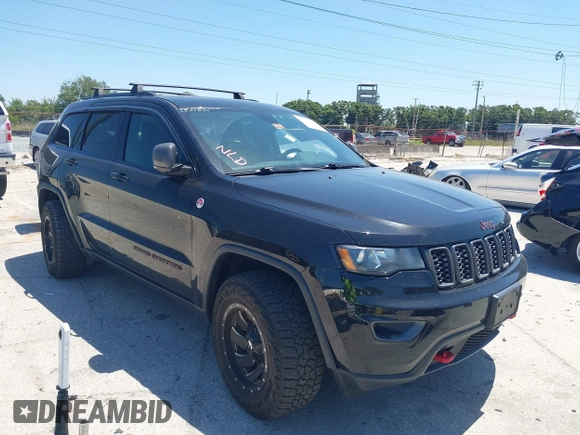 2017 Jeep Grand Cherokee Trailhawk with VIN 1C4RJFLG3HC836072, listed as a IAAI auction lot 42073775 with 139,374 mi miles and . Bid and sale history available at DreamBid. Image 1.