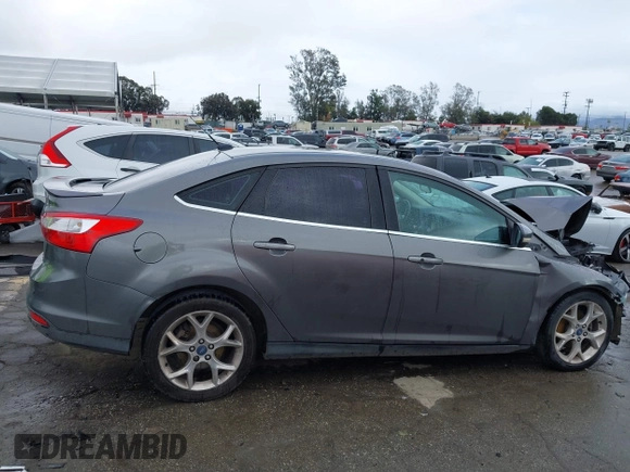 2013 Ford Focus Titanium with VIN 1FADP3J2XDL270393, listed as a IAAI auction lot 41814775 with 76,907 mi miles and . Bid and sale history available at carsss.com. Image 14.