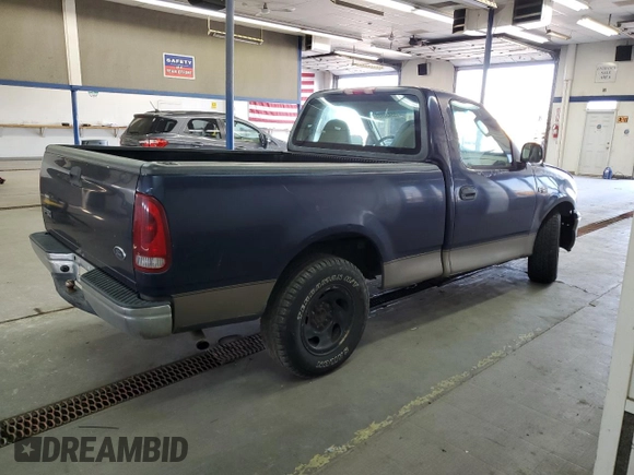 2003 Ford F-150 XL with VIN 1FTRF17293NA60031, listed as a Copart auction lot 55433885 with 186,557 mi miles and Salvage title. Bid and sale history available at DreamBid. Image 3.