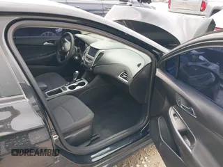 2018 Chevrolet Cruze LS with VIN 1G1BC5SM3J7210719, listed as a IAAI auction lot 41787077 with 93,489 mi miles and . Bid and sale history available at DreamBid. Image 5.