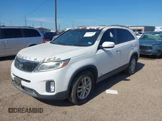 2015 Kia Sorento LX with VIN 5XYKT4A6XFG654663, listed as a IAAI auction lot 42196806 with 129,296 mi miles and . Bid and sale history available at DreamBid. Image 2.