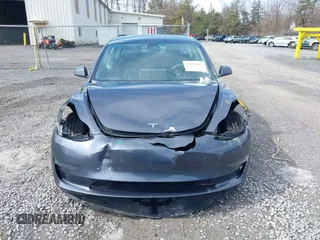 2023 Tesla Model 3 z VIN 5YJ3E1EA5PF451085, wystawiony jako IAAI lot #41941655 z przebiegiem 56 532 mil mil oraz . Historia ofert i sprzedaży dostępna na DreamBid. Obrazek 12.