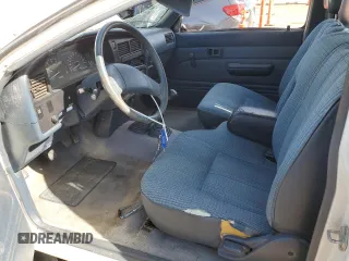 1991 Toyota Pickup DLX z VIN JT4VN13D4M5065504, wystawiony jako Copart lot #54058595 z przebiegiem 108 782 mil mil oraz Tytuł czysty. Historia ofert i sprzedaży dostępna na DreamBid. Obrazek 7.