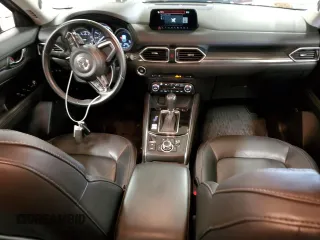 2018 Mazda CX-5 Grand Touring with VIN JM3KFBDM6J0455993, listed as a Copart auction lot 61414275 with 77,570 mi miles and Salvage title. Bid and sale history available at DreamBid. Image 8.