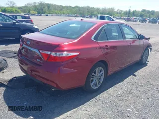 2015 Toyota Camry LE with VIN 4T1BD1FK9FU163867, listed as a IAAI auction lot 42133336 with 211,820 mi miles and . Bid and sale history available at DreamBid. Image 4.