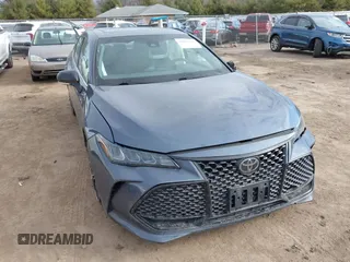 2019 Toyota Avalon XLE z VIN 4T1BZ1FB3KU024135, wystawiony jako IAAI lot #41887321 z przebiegiem 80 547 mil mil oraz . Historia ofert i sprzedaży dostępna na DreamBid. Obrazek 1.