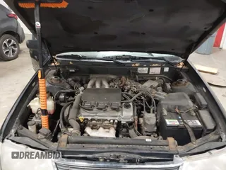 1998 Toyota Avalon XL with VIN 4T1BF18B5WU229340, listed as a IAAI auction lot 41957632 with 212,657 mi miles and . Bid and sale history available at DreamBid. Image 10.