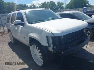 2007 Chevrolet Tahoe LT z VIN 1GNFC13J87J132303, wystawiony jako IAAI lot #42162969 z przebiegiem Nie podano mil oraz . Historia ofert i sprzedaży dostępna na DreamBid. Obrazek 1.