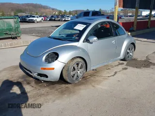 2006 Volkswagen New Beetle Coupe with VIN 3VWRG31CX6M406075, listed as a IAAI auction lot 41799188 with 88,271 mi miles. Bid and sale history available at carsss.com. Image 2.
