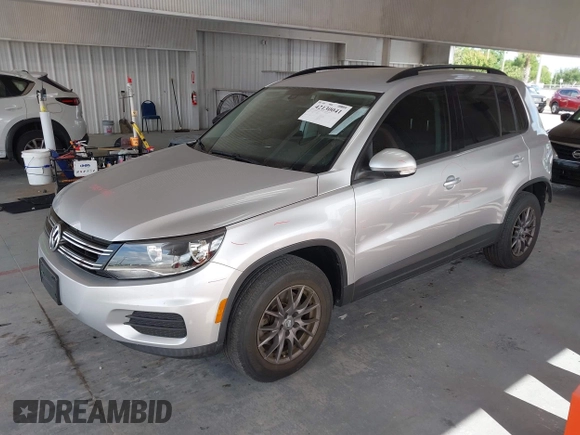 2016 Volkswagen Tiguan S with VIN WVGBV7AX2GW535784, listed as a IAAI auction lot 42130041 with 35,718 mi miles and . Bid and sale history available at DreamBid. Image 2.