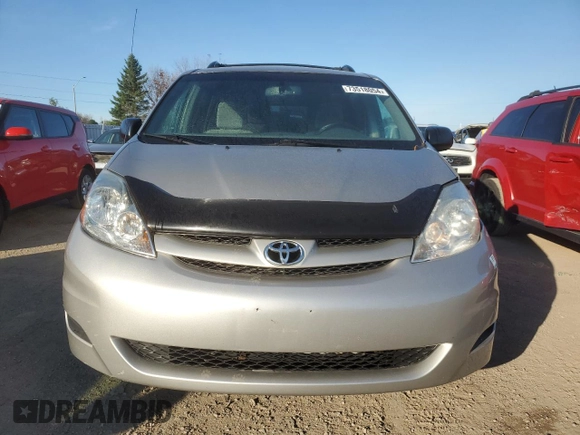 2010 Toyota Sienna with VIN 5TDZK4CCXAS335182, listed as a Copart auction lot 73518054 with 180,248 mi miles and Clean Title. Bid and sale history available at DreamBid. Image 5.