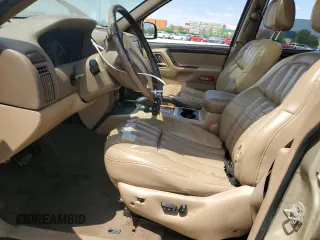 2000 Jeep Grand Cherokee Limited z VIN 1J4GW58N0YC272532, wystawiony jako Copart lot #57524225 z przebiegiem 238 921 mil mil oraz Szkoda całkowita • Salvage title. Historia ofert i sprzedaży dostępna na DreamBid. Obrazek 7.