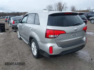 2014 Kia Sorento EX with VIN 5XYKUDA71EG456929, listed as a IAAI auction lot 42012720 with 128,557 mi miles. Bid and sale history available at carsss.com. Image 3.