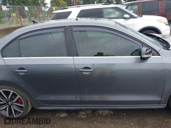 2014 Volkswagen Jetta GLI z VIN 3VW4T7AJ2EM208598, wystawiony jako IAAI lot #42381855 z przebiegiem 82 761 mil mil oraz . Historia ofert i sprzedaży dostępna na DreamBid. Obrazek 13.