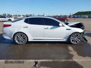 2015 Kia Optima SXL Turbo with VIN 5XXGR4A6XFG412013, listed as a IAAI auction lot 41960226 with 143,745 mi miles and . Bid and sale history available at DreamBid. Image 13.