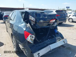 2014 Toyota Camry L with VIN 4T1BF1FK2EU817293, listed as a IAAI auction lot 41882906 with 189,719 mi miles. Bid and sale history available at carsss.com. Image 3.