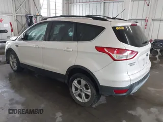 2014 Ford Escape SE with VIN 1FMCU0GX7EUB33872, listed as a IAAI auction lot 41953027 with 239,403 mi miles. Bid and sale history available at carsss.com. Image 3.