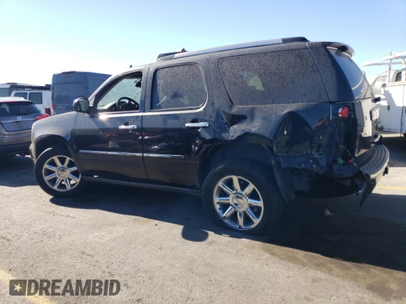 2011 GMC Yukon Denali with VIN 1GKS2EEF6BR137914, listed as a Copart auction lot 72957134 with 109,574 mi miles and Salvage Title. Bid and sale history available at carsss.com. Image 2.