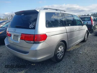 2010 Honda Odyssey EX-L with VIN 5FNRL3H62AB083068, listed as a IAAI auction lot 41950383 with 134,150 mi miles. Bid and sale history available at carsss.com. Image 4.