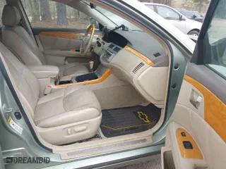 2005 Toyota Avalon XL with VIN 4T1BK36B55U033424, listed as a IAAI auction lot 41954652 with 231,640 mi miles. Bid and sale history available at carsss.com. Image 5.