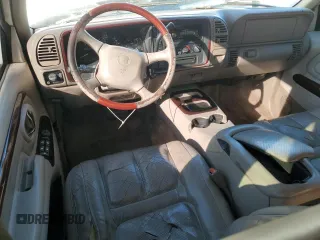 1999 Cadillac Escalade z VIN 1GYEK13R3XR406970, wystawiony jako Copart lot #87623365 z przebiegiem 189 339 mil mil oraz Szkoda całkowita • Salvage title. Historia ofert i sprzedaży dostępna na DreamBid. Obrazek 8.