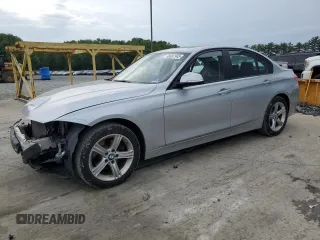 2015 BMW 3 Series 328i xDrive with VIN WBA3B3G57FNT18071, listed as a Copart auction lot 59697945 with 132,949 mi miles and Salvage title. Bid and sale history available at DreamBid. Image 1.