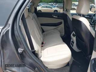 2020 Ford Edge Titanium z VIN 2FMPK4K98LBA76737, wystawiony jako IAAI lot #41981689 z przebiegiem 93 501 mil mil oraz . Historia ofert i sprzedaży dostępna na DreamBid. Obrazek 8.