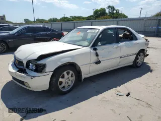 2002 Acura RL with VIN JH4KA96582C001815, listed as a Copart auction lot 56925125 with Not provided miles and Salvage title. Bid and sale history available at DreamBid. Image 1.