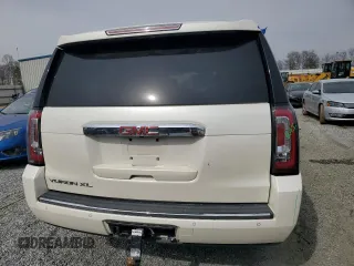 2015 GMC Yukon XL Denali z VIN 1GKS1JKJ7FR552458, wystawiony jako Copart lot #48248655 z przebiegiem 162 798 mil mil oraz Szkody całkowita. Historia ofert i sprzedaży dostępna na DreamBid. Obrazek 6.