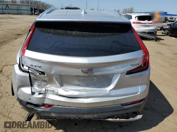 2020 Cadillac XT4 AWD Premium Luxury z VIN 1GYFZDR44LF026447, wystawiony jako Copart lot #53970785 z przebiegiem 118 035 mil mil oraz Szkoda całkowita • Salvage title. Historia ofert i sprzedaży dostępna na DreamBid. Obrazek 6.