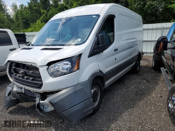 2018 Ford Transit z VIN 1FTYR2CMXJKA85664, wystawiony jako Copart lot #62708365 z przebiegiem Nie podano mil oraz Szkoda całkowita • Salvage title. Historia ofert i sprzedaży dostępna na DreamBid. Obrazek 1.