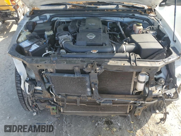 2014 Nissan Frontier SV with VIN 1N6AD0ER1EN765872, listed as a Copart auction lot 51267665 with 102,310 mi miles and Salvage title. Bid and sale history available at DreamBid. Image 11.