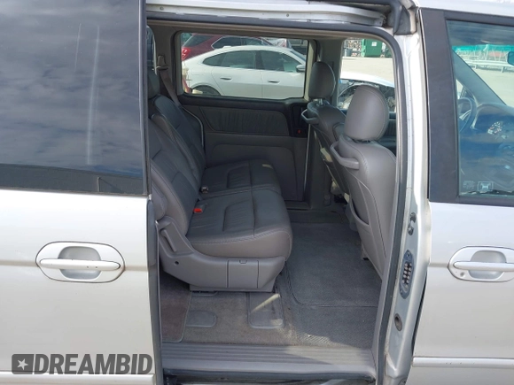 2004 Honda Odyssey EX-L with VIN 5FNRL18964B125664, listed as a IAAI auction lot 41531606 with 327,493 mi miles and . Bid and sale history available at DreamBid. Image 8.