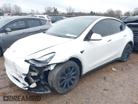 2021 Tesla Model Y Standard Range with VIN 5YJYGDED8MF114076, listed as a IAAI auction lot 41567295 with 150,133 mi miles and . Bid and sale history available at DreamBid. Image 2.