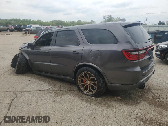 2018 Dodge Durango SRT with VIN 1C4SDJGJ6JC232667, listed as a Copart auction lot 57871095 with 54,945 mi miles and Salvage title. Bid and sale history available at DreamBid. Image 2.