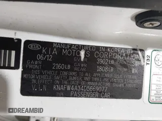 2013 Kia Forte SX with VIN KNAFW4A34D5669077, listed as a IAAI auction lot 41951317 with 96,509 mi miles. Bid and sale history available at carsss.com. Image 9.