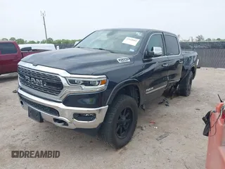 2020 Ram 1500 Limited with VIN 1C6SRFHT5LN422246, listed as a IAAI auction lot 41948083 with 82,032 mi miles and . Bid and sale history available at DreamBid. Image 2.
