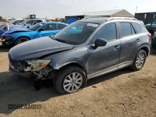 2014 Mazda CX-5 Sport z VIN JM3KE4BE1E0359446, wystawiony jako Copart lot #54562545 z przebiegiem 128 150 mil mil oraz Szkoda całkowita • Salvage title. Historia ofert i sprzedaży dostępna na DreamBid. Obrazek 1.