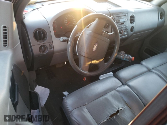 2006 Ford F-150 XL with VIN 1FTRF14W86NA32023, listed as a Copart auction lot 89320095 with 176,811 mi miles and Salvage title. Bid and sale history available at DreamBid. Image 8.