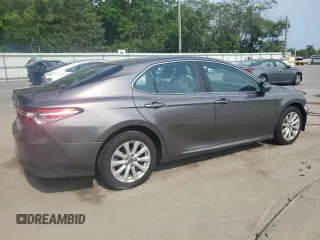 2018 Toyota Camry LE с VIN 4T1B11HK1JU118582, выставлен на аукционе Copart как лот 57972895 с пробегом 39 776 миль миль и Списание • Salvage title. История ставок и продаж доступна на DreamBid. Изображение 3.