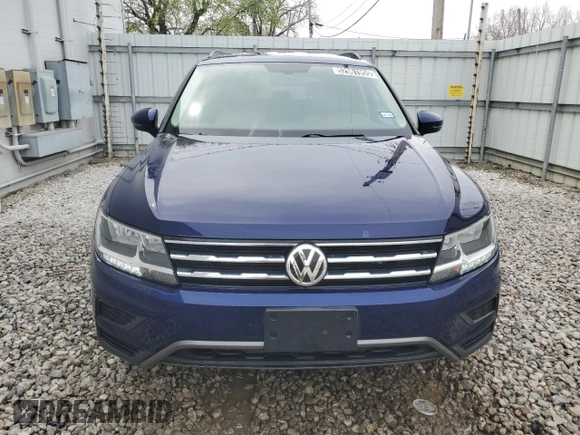 2021 Volkswagen Tiguan SE z VIN 3VV2B7AX3MM154049, wystawiony jako Copart lot #52961955 z przebiegiem 77 349 mil mil oraz Czysty tytuł • Clean title. Historia ofert i sprzedaży dostępna na DreamBid. Obrazek 5.
