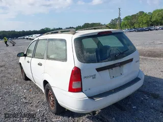 2006 Ford Focus SE with VIN 1FAFP36N76W179286, listed as a IAAI auction lot 41988568 with 277,009 mi miles. Bid and sale history available at carsss.com. Image 3.