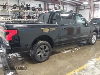 2023 Ford F-150 Lightning Pro with VIN 1FTVW1EV5PWG59228, listed as a IAAI auction lot 40838790 with Not Provided miles and . Bid and sale history available at DreamBid. Image 4.