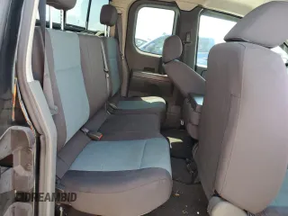 2006 Nissan Titan SE z VIN 1N6BA06A66N569501, wystawiony jako Copart lot #59872455 z przebiegiem 80 057 mil mil oraz Szkoda całkowita • Salvage title. Historia ofert i sprzedaży dostępna na DreamBid. Obrazek 10.