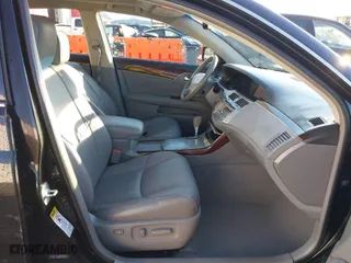 2009 Toyota Avalon XL with VIN 4T1BK36B69U325444, listed as a IAAI auction lot 41403510 with 134,958 mi miles. Bid and sale history available at carsss.com. Image 5.