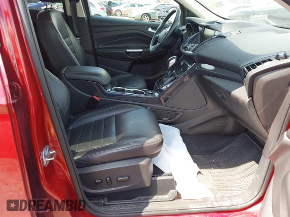 2015 Ford Escape Titanium z VIN 1FMCU9J91FUC58933, wystawiony jako IAAI lot #42583736 z przebiegiem 147 359 mil mil oraz . Historia ofert i sprzedaży dostępna na DreamBid. Obrazek 5.