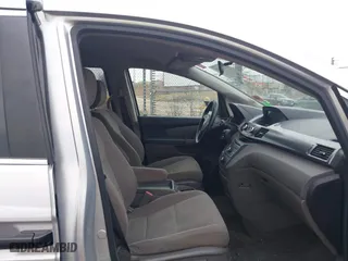 2014 Honda Odyssey LX with VIN 5FNRL5H22EB026657, listed as a IAAI auction lot 41114634 with 132,125 mi miles. Bid and sale history available at carsss.com. Image 5.